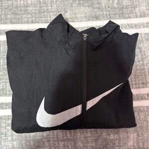 Nike Black windbreaker with White Swoosh.